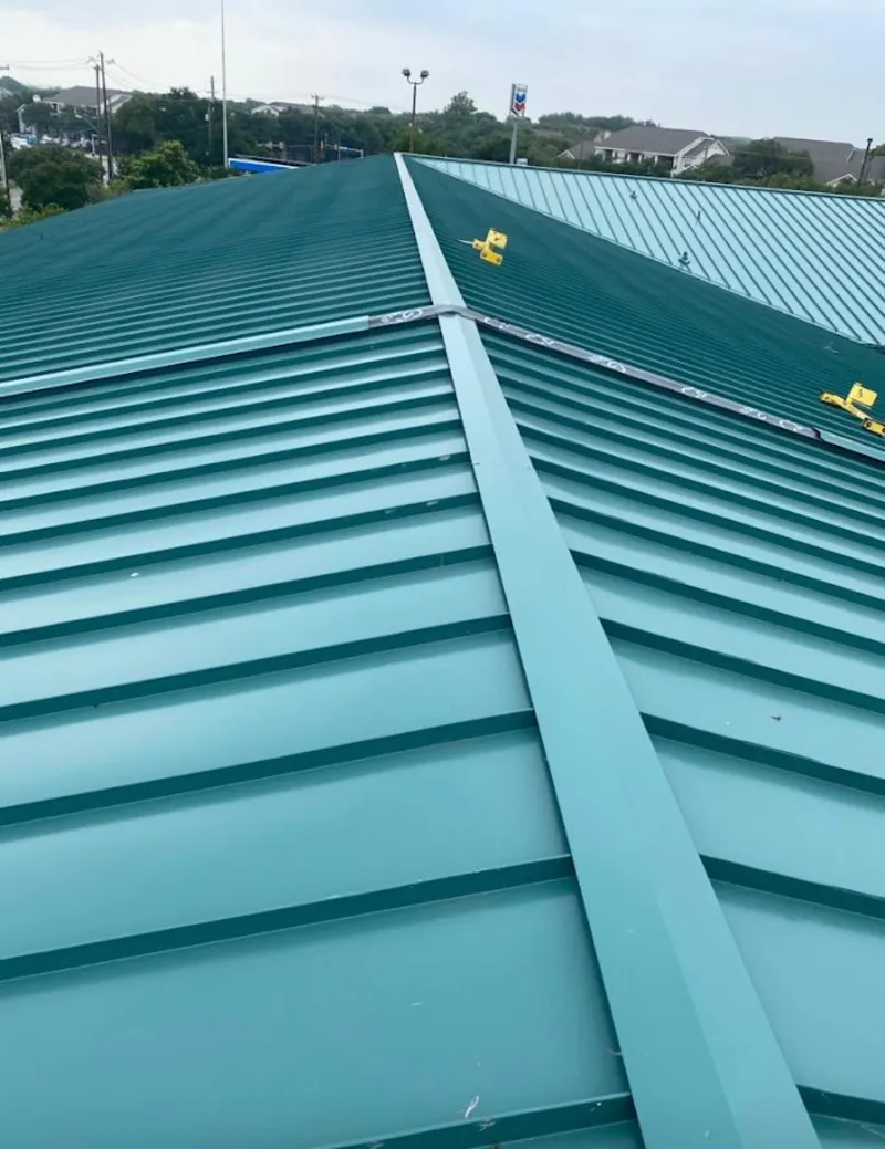 Green commercial metal roof ridge and valley for Metal Roof Repair in Madera Acres